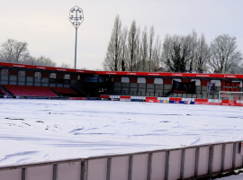 Salford City's Peninsula Stadium pitch covered in snow. Image Credit: Salford City FC.