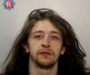 Salford police launch appeal for wanted 27-year-old man