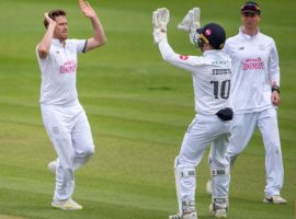 Liam Dawson celebrates the early breakthrough wicket of Luke Wells