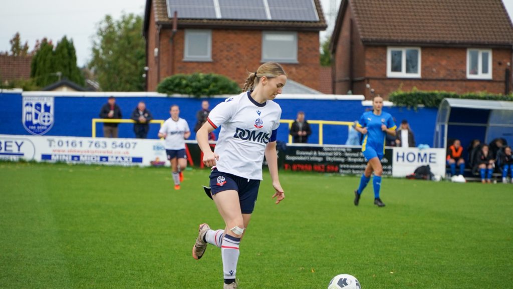 Image of Lexi playing for Bolton Wamdereres