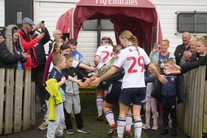 Lexi with the young children at Bolton 