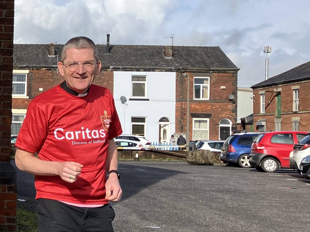 Fr Chris Gorton running for charity - Image provided by diocese charity, Caritas Salford.