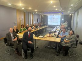 Photo of Paul Dennett and councillors discussing pension credits. Taken by Andrew Brunt