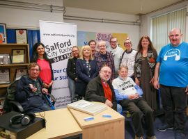 Some of the volunteers at Salford City Radio. - Salix Homes