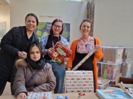 National Literacy Trust wrapping books for children - via National Literacy Trust