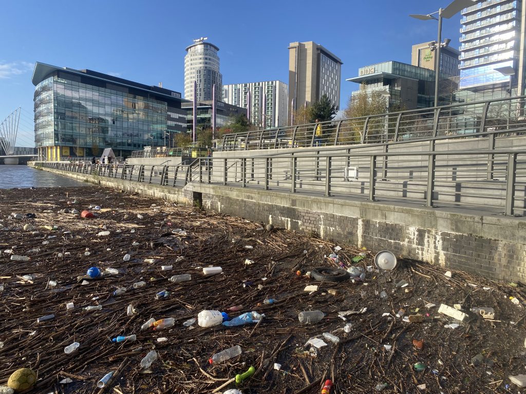 Debris build up at Salford Quays from Storm Bert