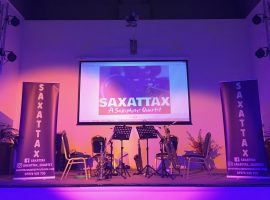 Saxttax performing at Eccles Hall