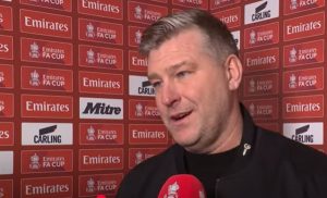 Karl Robinson shared praise towards his players after the 8-0 defeat - Youtube