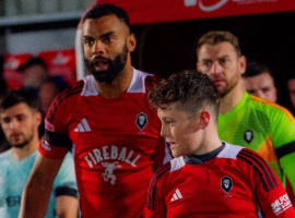 Curtis Tilt leading Salford City out at the Peninsula Stadium