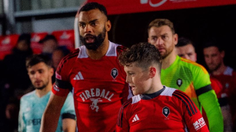 Curtis Tilt leading Salford City out at the Peninsula Stadium