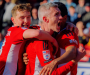 Salford City battle past Grimsby Town to keep play-off hopes intact