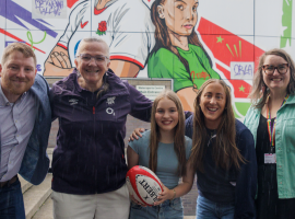 Orla O’Hare, the young player featured in the mural, Gill Burns, former Red Rose and World Cup winner, Cllr Jack Youd, Salford Deputy City Mayor, Cllr Hannah Robinson Smith, Lead Member for Culture, Heritage, Equalities, Sports and Leisure.